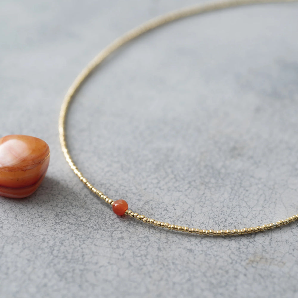 
                      
                        Ketting Flora Carnelian-gold
                      
                    