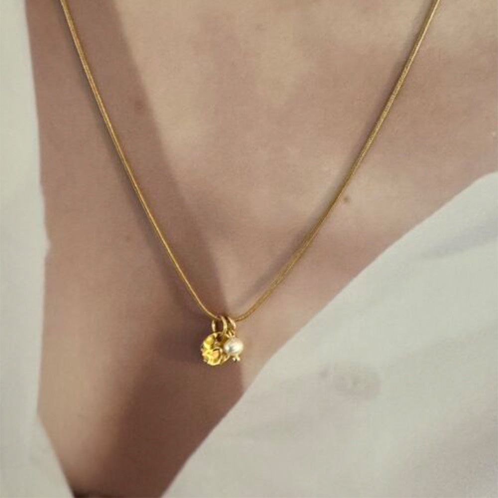 
                      
                        Ketting Hammered Coin & Pearl-gold
                      
                    