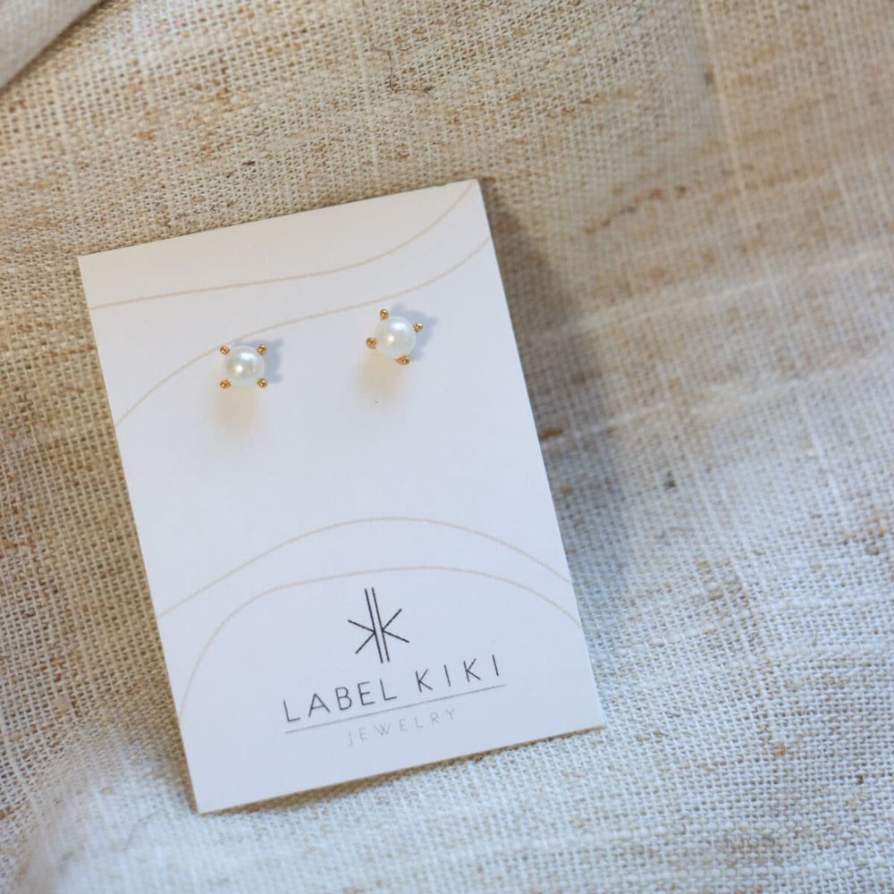 
                      
                        Studs Pearl-gold
                      
                    