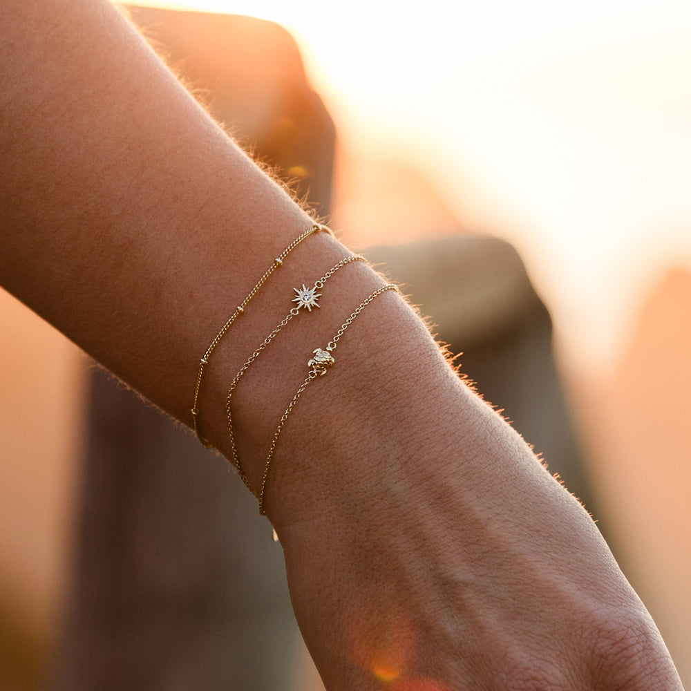 
                      
                        Armband Go Slow-gold
                      
                    
