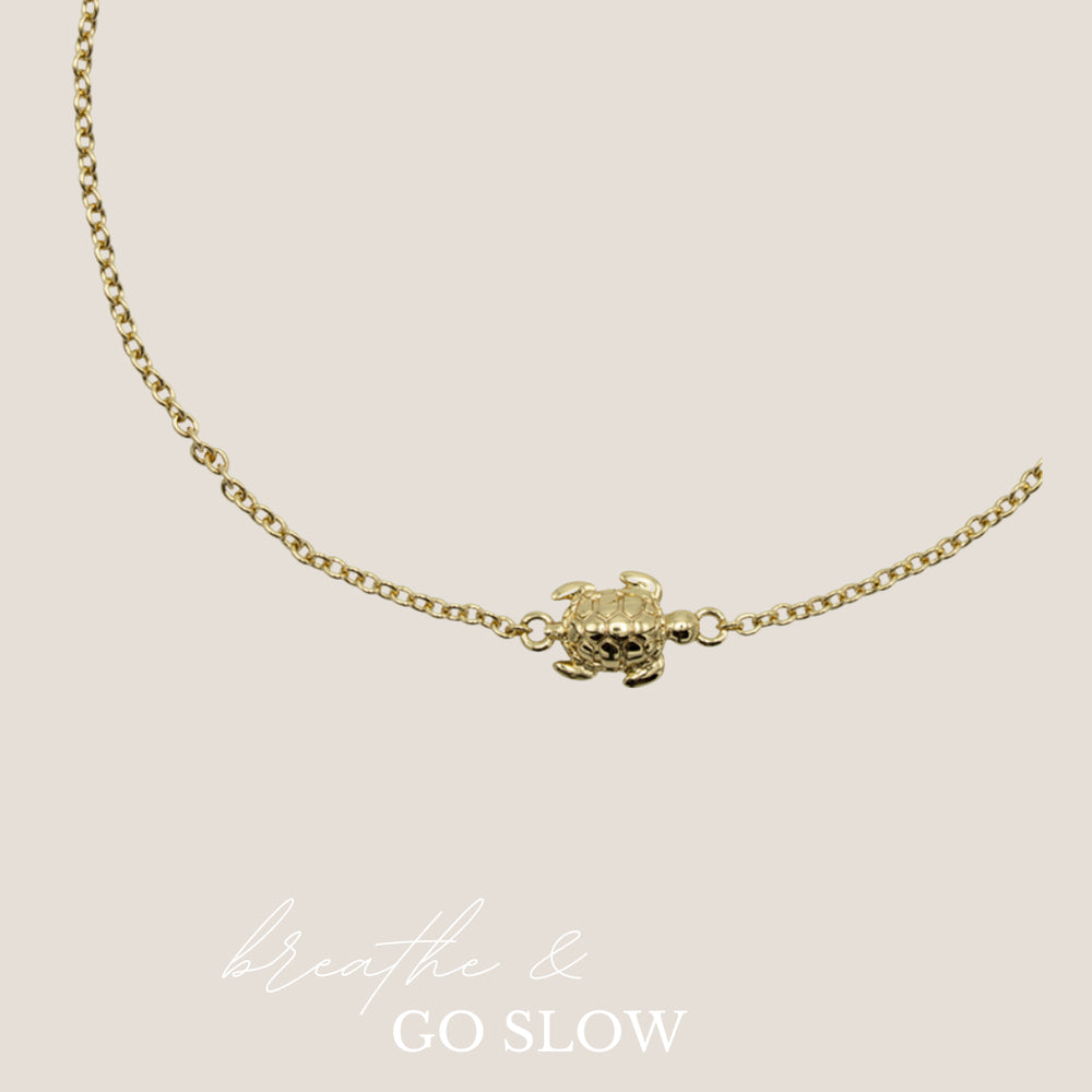 
                      
                        Armband Go Slow-gold
                      
                    