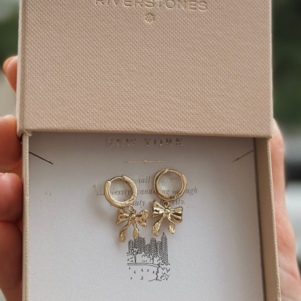 
                      
                        Oorbellen Festive Hoops New York-gold
                      
                    